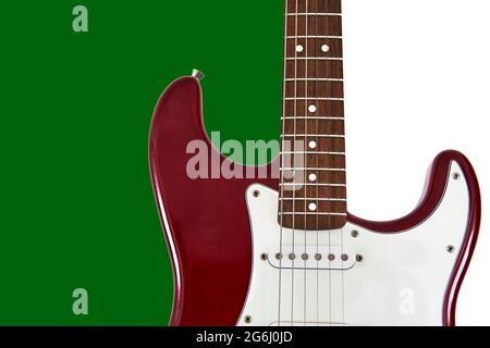 red electric guitar on a white and green background as a symbol of Italy flag. horizontal and copy space Stock Photo