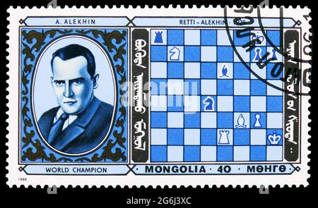 MOSCOW, RUSSIA - MARCH 21, 2020: Postage stamp printed in Mongolia shows Alekhine, France, Chess Champions serie, circa 1986 Stock Photo