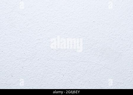 Blank concrete white rough wall for background. Beautiful white cement wall plastered surface background pattern. Stock Photo