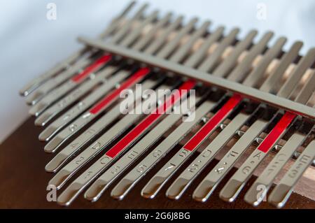 kalimba,mbira or thumb piano  is an African musical instrument.close up kalimba keys. Stock Photo