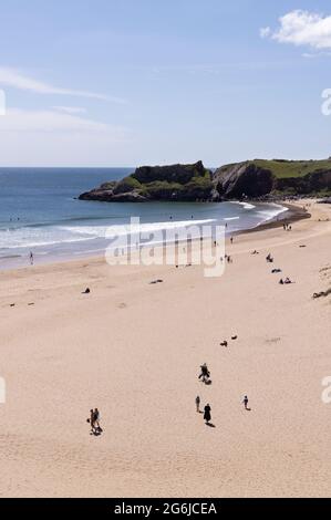 Pembrokeshire coast - people on the uncrowded Broad Haven Beach in summer sunshine, the Stackpole Estate, Pembrokeshire, Wales UK Stock Photo