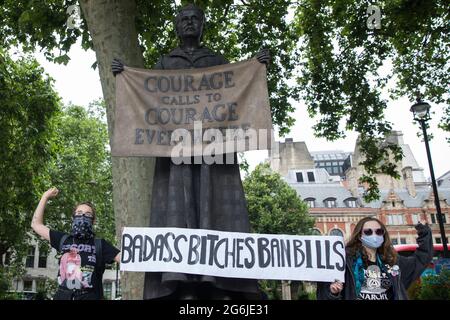 London, UK. 5th July, 2021. Activists hold a banner in front of the statue of Millicent Fawcett in Parliament Square during a Kill The Bill protest against the Police, Crime, Sentencing and Courts (PCSC) Bill 2021 as MPs consider amendments to the Bill in the House of Commons. The PCSC Bill would grant the police a range of new discretionary powers to shut down protests. Credit: Mark Kerrison/Alamy Live News Stock Photo