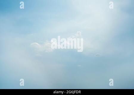 Scattered cloud clusters in a blue sky, blue sky background with white clouds, Stock Photo