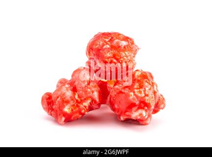 Red Cinnamon Popcorn on a White Background Stock Photo