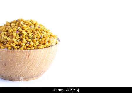 A Bowl of Pellets of Yellow Bee Pollen Stock Photo