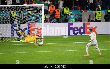 07 July 2021 - Italy v Spain - UEFA Euro 2020 Semi-Final - Wembley - London  Italy's Gianluigi Donnarumma saves the penalty from Alvaro Morata in the penalty shootout Picture Credit : © Mark Pain / Alamy Live News Stock Photo
