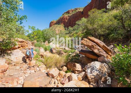 Hikers on the walking trail at popular Emma Gorge, El Questro, Gibb River Road, Western Australia, WA, Australia Stock Photo