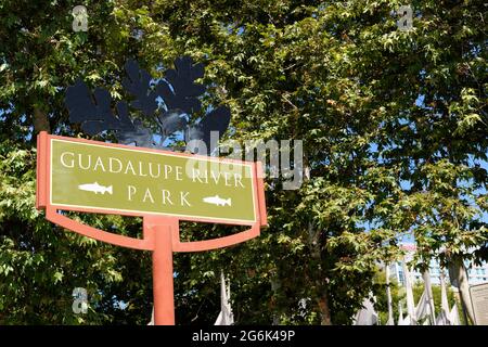 Guadalupe River Park sign adjacent to the park in downtown San Jose, California; venue for outdoor recreation and festivals in the Silicon Valley. Stock Photo