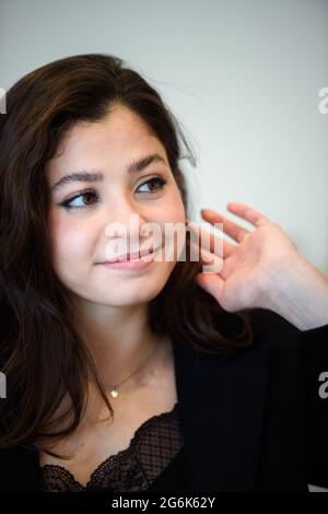 Hamburg, Germany. 12th June, 2021. Yusra Mardini, a swimmer, sits in a meeting room of a Hamburg hotel during an interview. (to dpa 'Freigeschwommen: Yusra's long journey from refugee to silent heroine') Credit: Gregor Fischer/dpa/Alamy Live News Stock Photo