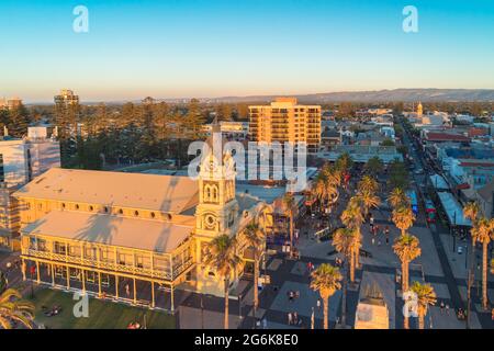 Adelaide, South Australia - January 12, 2019: Town Hall at Moseley Square in Glenelg with people walking by viewed from above at sunset Stock Photo