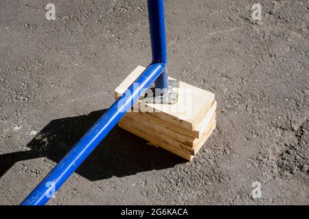 planks placed under the scaffolding, concept of a shaky construction Stock Photo