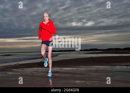 Eilish McColgan fashion shoot and training on Carnoustie beach photographed by Alan Peebles Stock Photo