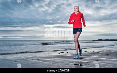 Eilish McColgan fashion shoot and training on Carnoustie beach photographed by Alan Peebles Stock Photo