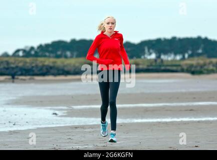 Eilish McColgan fashion shoot and training on Carnoustie beach photographed by Alan Peebles Stock Photo