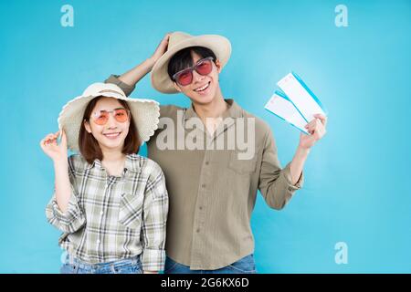 Young Asian couple happily traveling together Stock Photo
