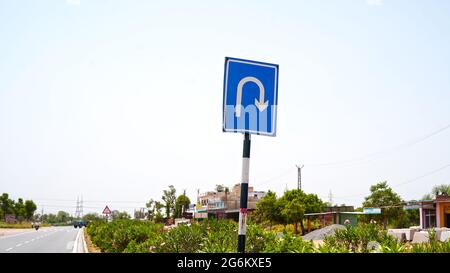 Real Move turn right speed board with blue background. Turn right speed board with attractive turning sign. Stock Photo