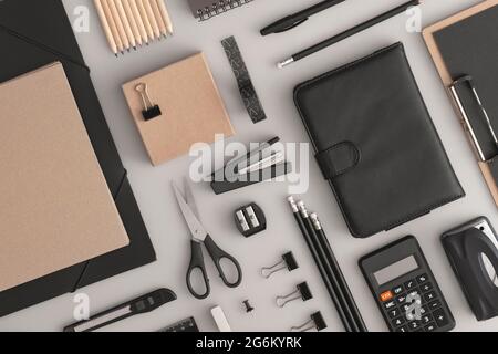 Pattern composition of office and school stationery on grey background. Back to school Stock Photo