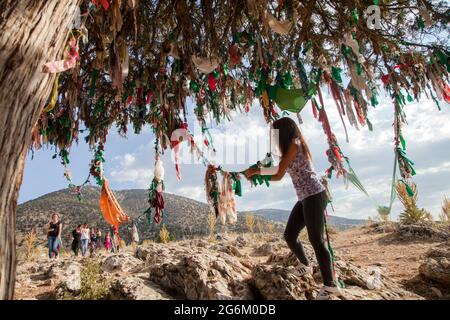 Elmali,Antalya,Turkey - 06-23-2016:A multicolored traditional wish tree in the village of Tekke Stock Photo