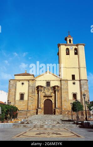 Spain, Extremadura, Badajoz province, Castuera. Church of St. Mary Magdalene, built in the 18th century, although it was unfinished. The coat of arms of the Order of Alcántara is carved on the facade. Stock Photo