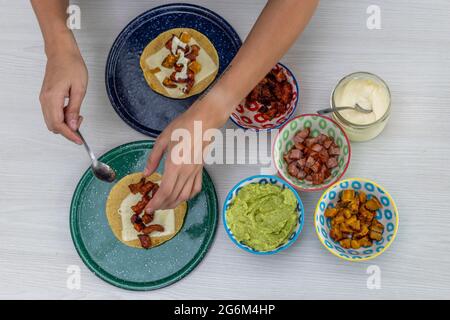 woman serving mexican tacos high angle view Stock Photo