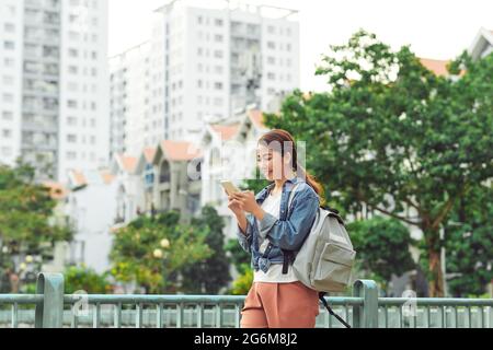 Korean student walking on campus Stock Photo - Alamy
