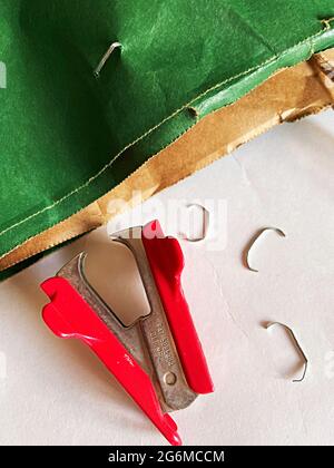 Still Life of Staples and a Staple Remover, USA Stock Photo