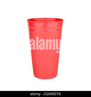 Red empty plastic cup white background isolated closeup, disposable blank glass for drink, beverage, cocktail, cold water, hot coffee mug, tea, juice Stock Photo