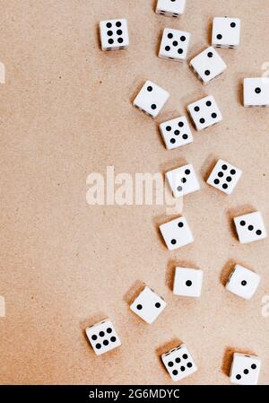 black and white playing dice on neutral background with copy space Stock Photo