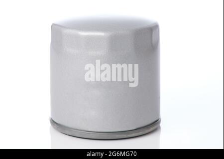 Metal grey new oil filter cylinder isolated on studio background Stock Photo