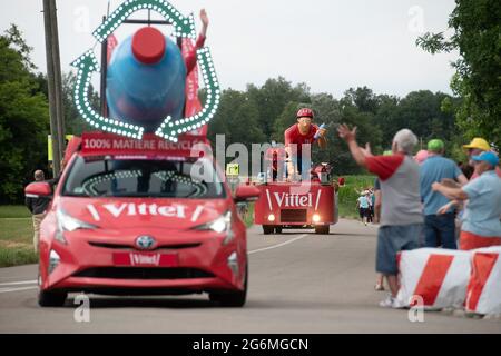 France, July 6, 2021,  Beaumont les Valence (26), July 6, 2021: passage of the Tour de France advertising caravan. Spectators and advertising vehicle of the mineral water brand Vittel. Photo by Delmarty J/ANDBZ/ABACAPRESS.COM Stock Photo