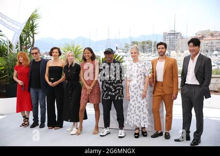 Cannes, France. 6th July, 2021. The jury for the 2021 Cannes Film Festival comprising French singer Mylene Farmer, Brazilian director Kleber Mendonca Filho, U.S. actress Maggie Gyllenhaal, Austrian director Jessica Hausner, Senegalese director Mati Diop, U.S. filmmaker Spike Lee, French actress Melanie Laurent, French actor Tahar Rahim, and South Korean actor Kang-Ho Song (L to R) poses during the photocall at the 74th Cannes International Film Festival in Cannes, southern France, July 6, 2021. Credit: Gao Jing/Xinhua/Alamy Live News Stock Photo