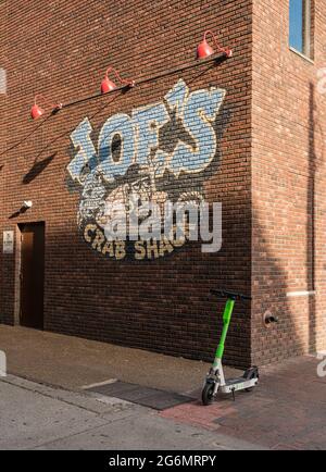 Nashville, Tennessee - 28 June 2021: Brick wall and sign for Joe's Crabshack in downtown Nashville Stock Photo