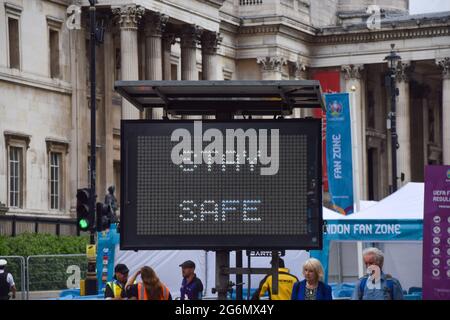 London, United Kingdom. 7th July 2021. Stay Safe sign at Trafalgar Square, where matches are screened, ahead of the England v Denmark Euro 2020 football semi final at Wembley Stadium. (Credit: Vuk Valcic / Alamy Live News) Stock Photo