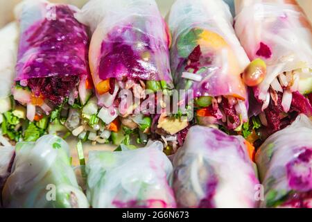 Close-up image of homemade vegetable spring rolls ready for a picnic Stock Photo