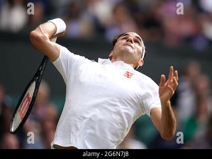 Roger Federer serves against Hubert Hurkacz in the quarter final match ...