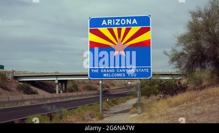 Welcome to Arizona road sign on the State border Route, US. The grand canyon state welcomes you. Stock Photo