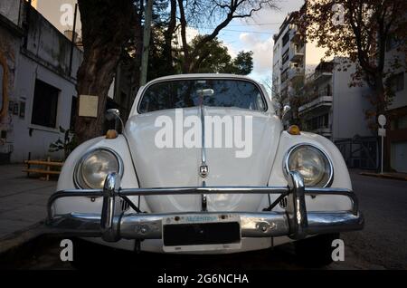 Old white Volkswagen Beetle, most likely made in Germany, still in use in Buenos Aires Stock Photo