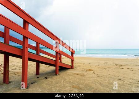 Luquillo Beach, Puerto Rico. Clouds, palms, lifeguard house Stock Photo