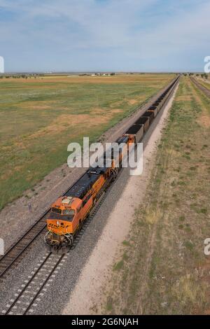 Roggen, Colorado - A Burlington Northern Santa Fe freight train carrying coal east of Denver. Stock Photo