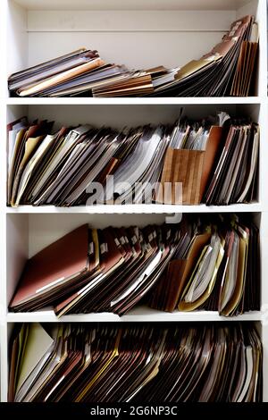 Files and folders on shelf business work for organizing papers Stock Photo