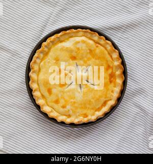 A Piece of Chicken Pot Pie, top view. Flat lay, overhead, from above. Stock Photo