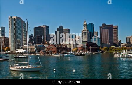 Sailboats Moored In Boston Harbor With The Custom House Tower In The Distance, Boston, Massachusetts, USA Stock Photo