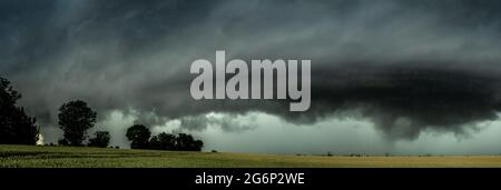 A violent thunderstorm is coming with heavy rain Stock Photo