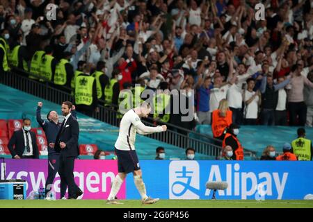England manager Gareth Southgate (2nd left) celebrates reaching the final at the final whistle after the UEFA Euro 2020 semi final match at Wembley Stadium, London. Picture date: Wednesday July 7, 2021. Stock Photo