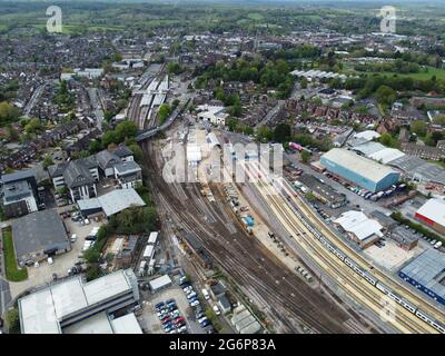 Aerial shot of Horsham Railway Station, Horsham Signal box & Rail sidings, with Horsham Town Centre in the Distance. Stock Photo