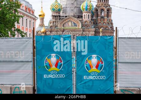 Saint Petersburg, Russia - July 7, 2021: an auxiliary entrance of a fan zone Football Village, with UEFA Euro 2020 logos and the barbed wire. Stock Photo