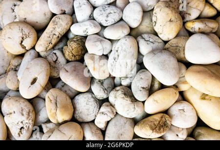 Stone, in small size, most in light earth tone color. Close up. Can be use as background. Stock Photo