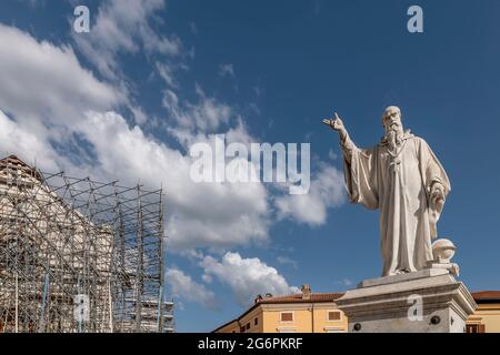 The ancient statue of San Benedetto in the homonymous square, Norcia, Italy Stock Photo