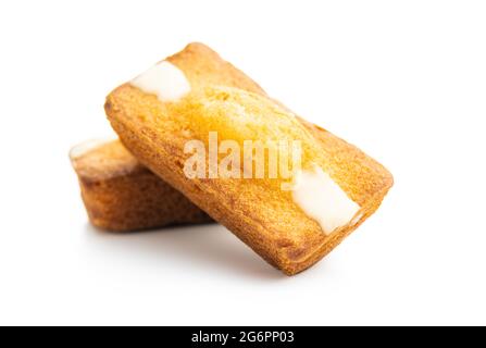 Mini sponge cakes. Sweet vanilla dessert isolated on white background. Stock Photo