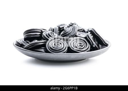 Spiral from liquorice candy isolated on white background. Stock Photo